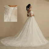 robe-de-mariee-boheme-en-dentelle-et-tulle