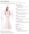Abito da sposa senza spalline con piume