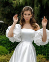 Vestido de novia con mangas largas abullonadas