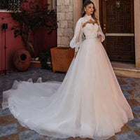 robe-de-mariee-princesse-manche-longue-bouffante