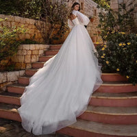 robe-de-mariee-princesse-manche-longue-bouffante