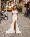 Abito da sposa drappeggiato senza spalline