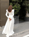 Vestido de novia de satén color marfil