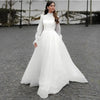 robe-mariee-col-montant-manche-longue