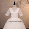 Abito da sposa con paillettes senza spalline