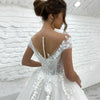 Abito da sposa da principessa con paillettes scintillanti