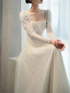 robe-mariee-col-bateau-manche-longue