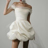 Abito da sposa corto con strascico