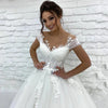 Abito da sposa da principessa con paillettes scintillanti