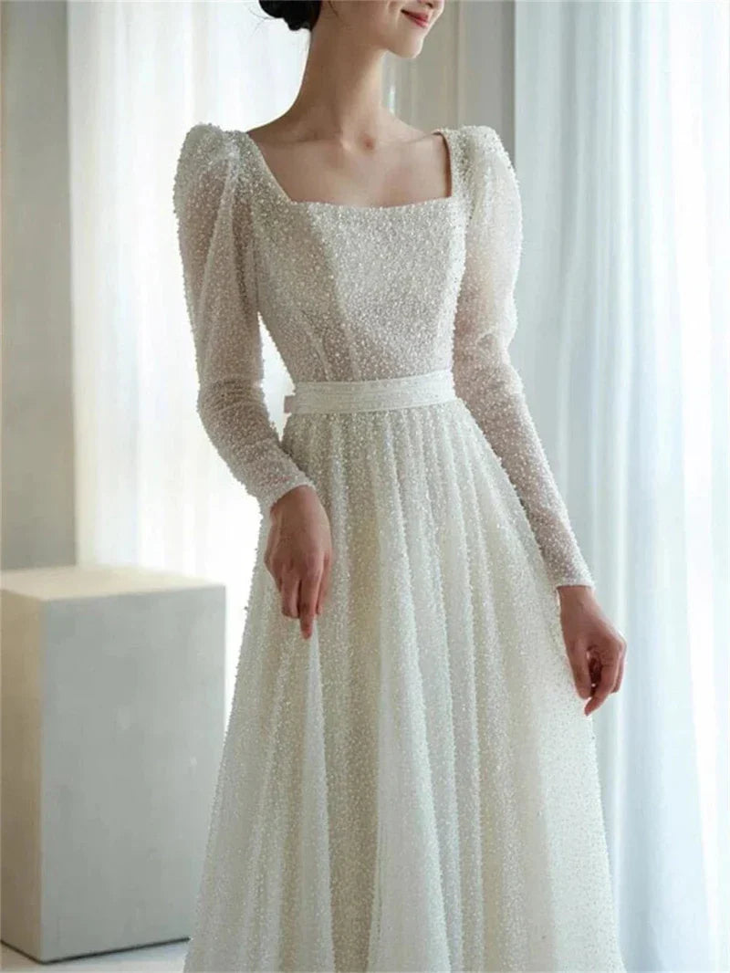 robe-mariee-col-bateau-manche-longue