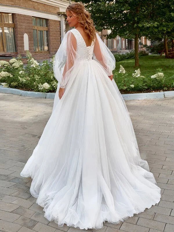 robe-de-mariee-a-manches-bouffantes-grande-taille