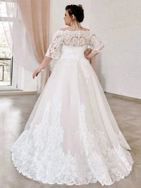 robe-de-mariee-dentelle-femme-ronde
