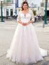 robe-de-mariee-pour-femme-ronde-avec-manche