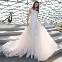 robe-de-mariee-princesse-avec-manche-courte